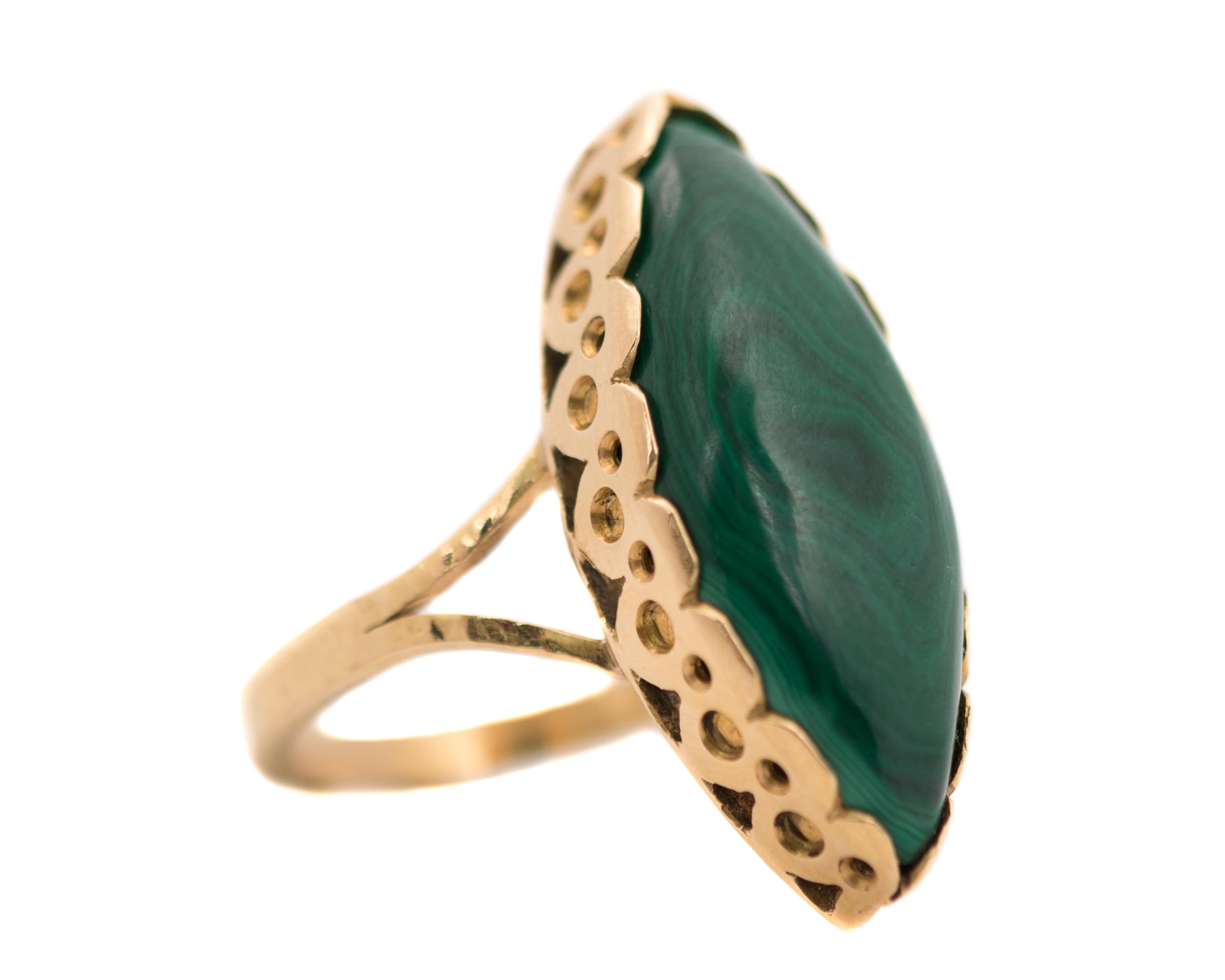 1980s Malachite Ring - 18 Karat Yellow Gold, Malachite

Features:
Marquise cut 3.0 carat Malachite center stone
French Bezel setting
18 Karat Yellow Gold setting
Split Shoulders
Open Gallery and Back

2.5 millimeter wide shank
Ring face measures 29