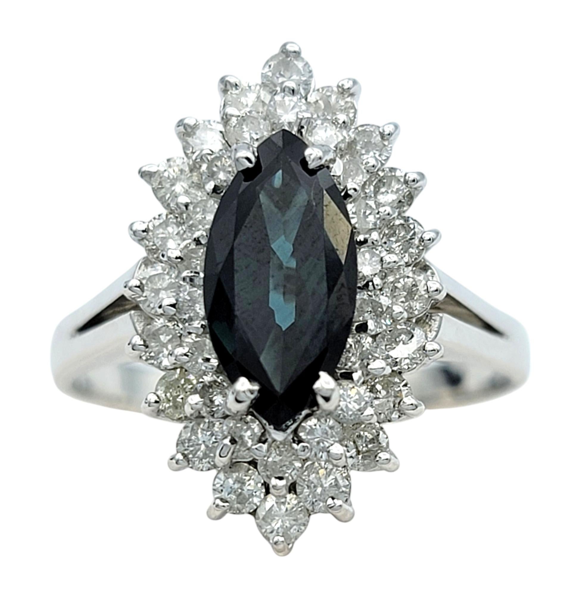 Ring Size: 11

Elevate your collection with this breathtaking Montana sapphire and diamond ring, a masterpiece of artistry and elegance. The centerpiece of this exquisite ring is a stunning 2.63 carat marquise-cut Montana sapphire in a vivid