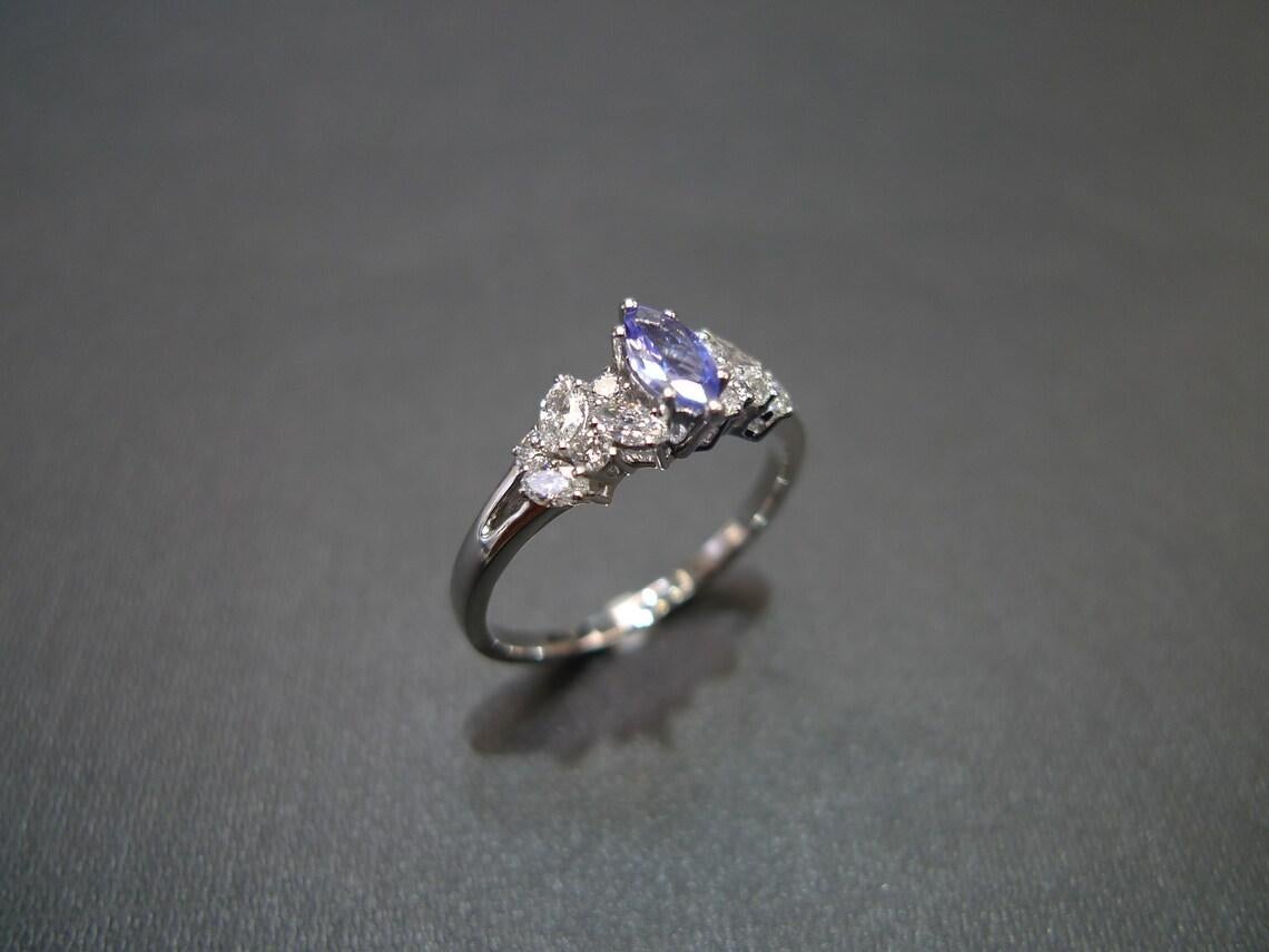 For Sale:  Marquise Cut Natural Tanzanite and Diamond Engagement Ring in 18K White Gold 2
