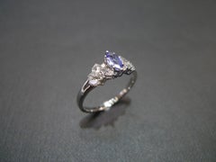 Marquise Cut Natural Tanzanite and Diamond Engagement Ring in 18K White Gold