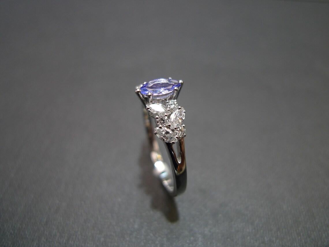 For Sale:  Marquise Cut Natural Tanzanite and Diamond Engagement Ring in 18K White Gold 4
