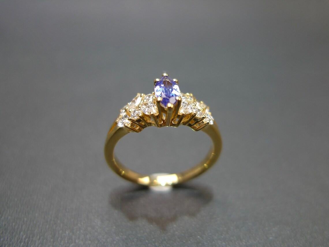 For Sale:  Marquise Cut Natural Tanzanite and Diamond Engagement Ring in 18K Yellow Gold 10