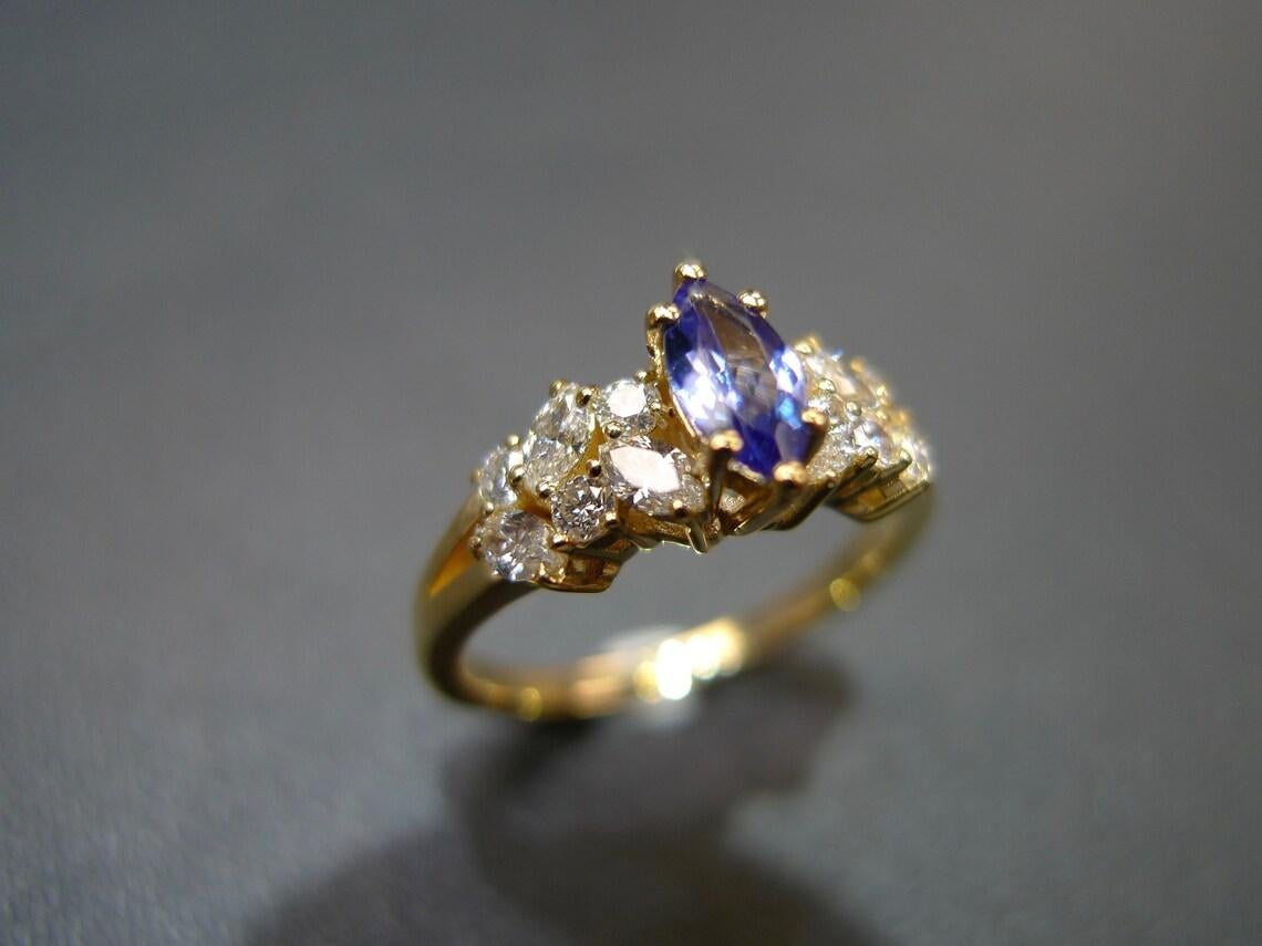 For Sale:  Marquise Cut Natural Tanzanite and Diamond Engagement Ring in 18K Yellow Gold 3