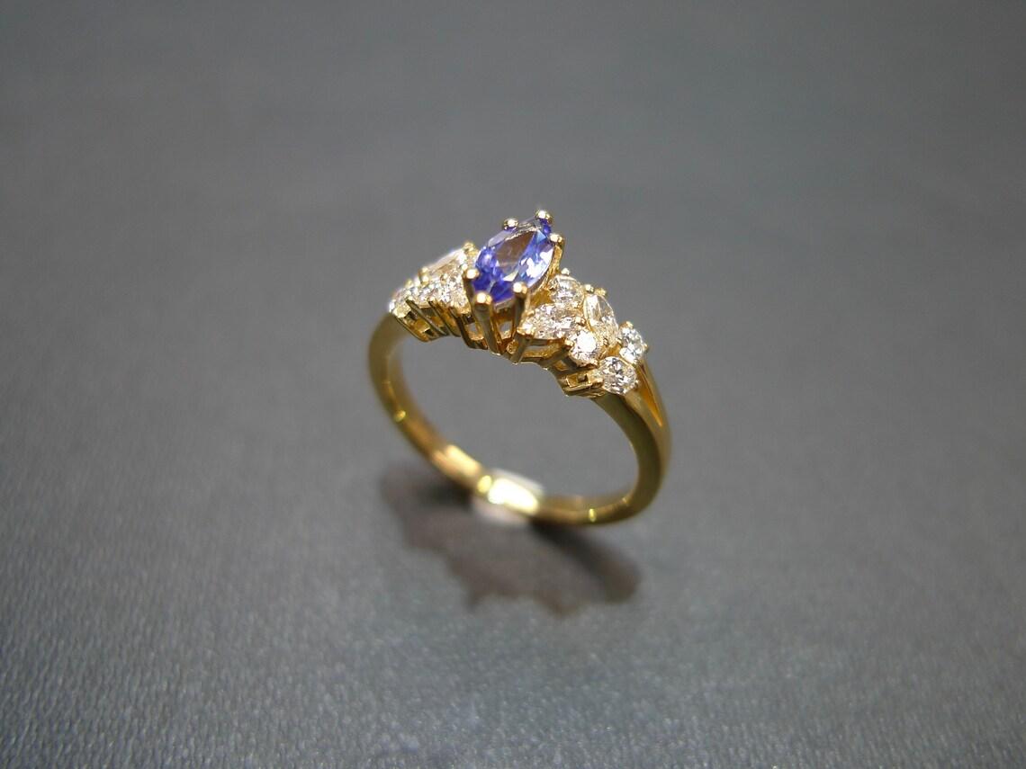 For Sale:  Marquise Cut Natural Tanzanite and Diamond Engagement Ring in 18K Yellow Gold 4