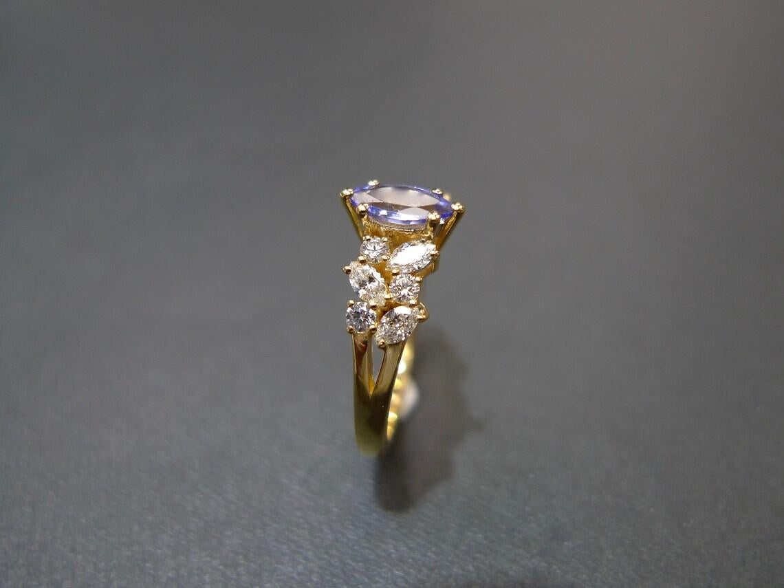 For Sale:  Marquise Cut Natural Tanzanite and Diamond Engagement Ring in 18K Yellow Gold 6