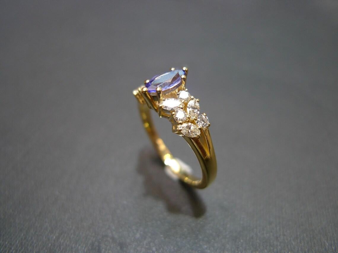 For Sale:  Marquise Cut Natural Tanzanite and Diamond Engagement Ring in 18K Yellow Gold 7