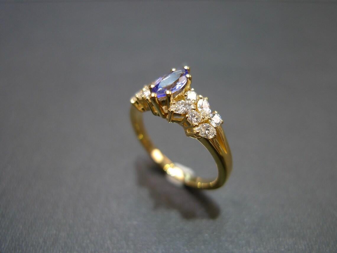 For Sale:  Marquise Cut Natural Tanzanite and Diamond Engagement Ring in 18K Yellow Gold 8