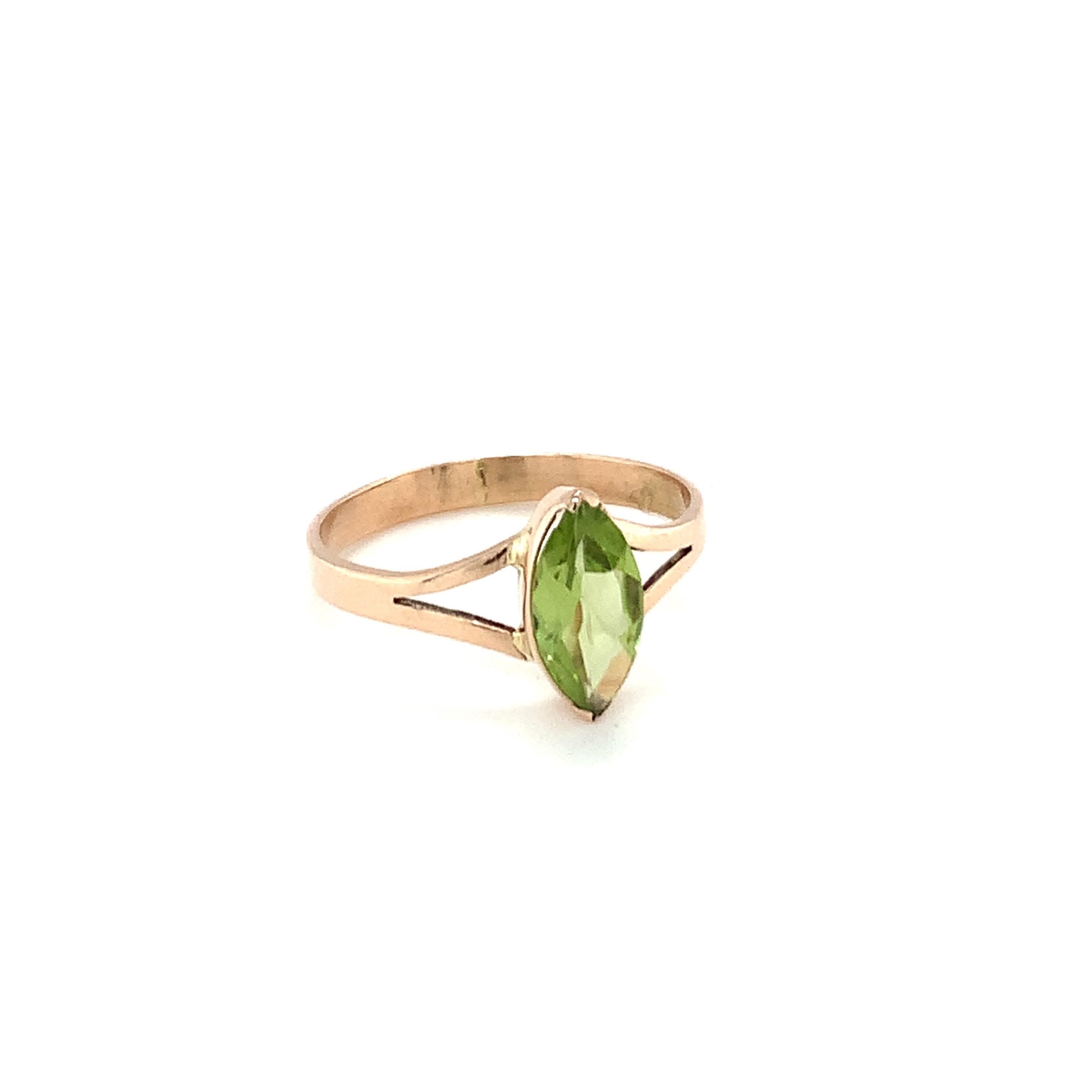 Hand cut and polished natural peridot ring is crafted with hand in 14K yellow gold. 
Ideal for daily casual wear.
Image is enlarged for a closer look
Ethically sourced natural gem stone.