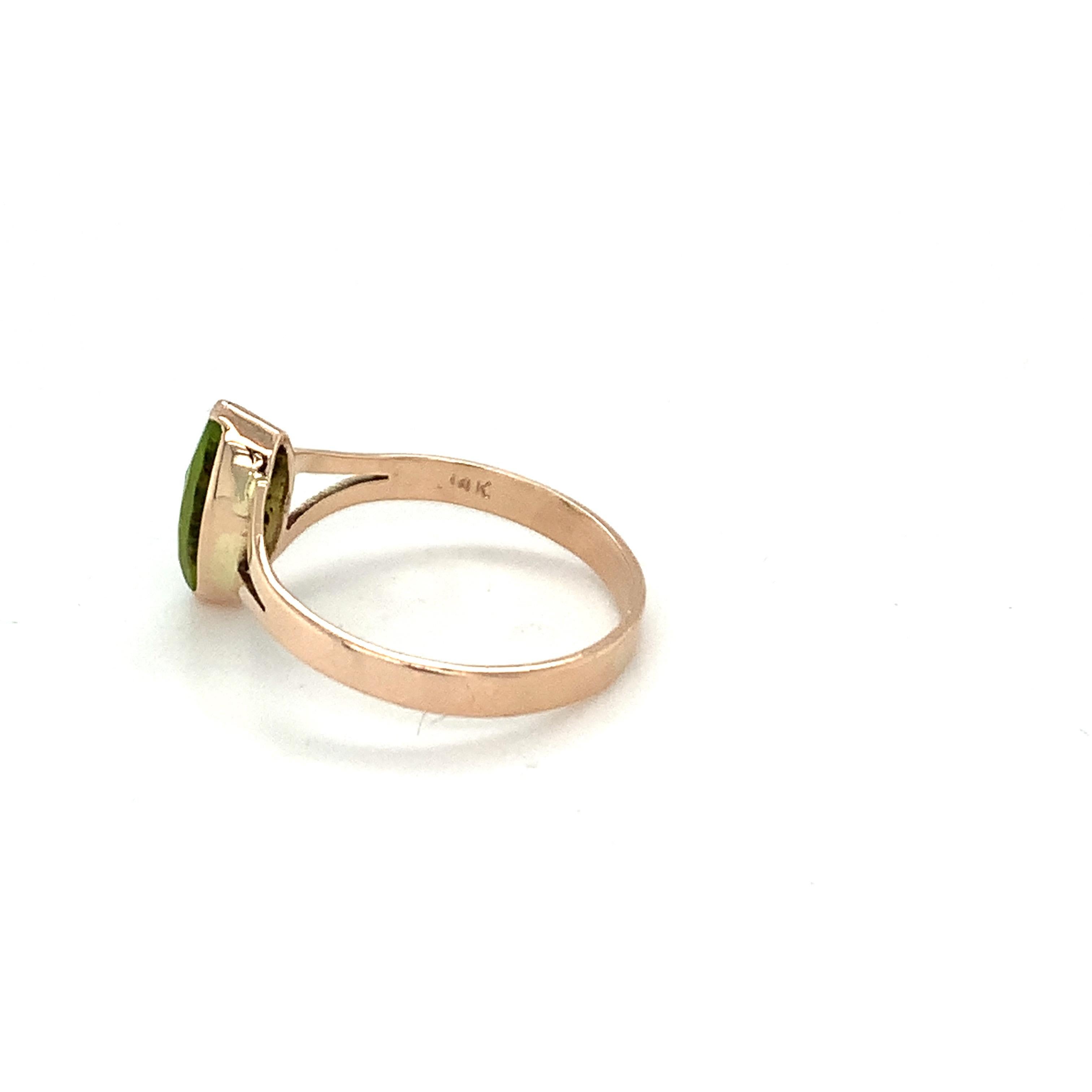 Artisan Marquise Cut Peridot Ring Set in 14k Yellow Gold For Sale