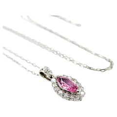 Marquise Cut Pink Sapphire & Diamond Halo Pendant in Platinum