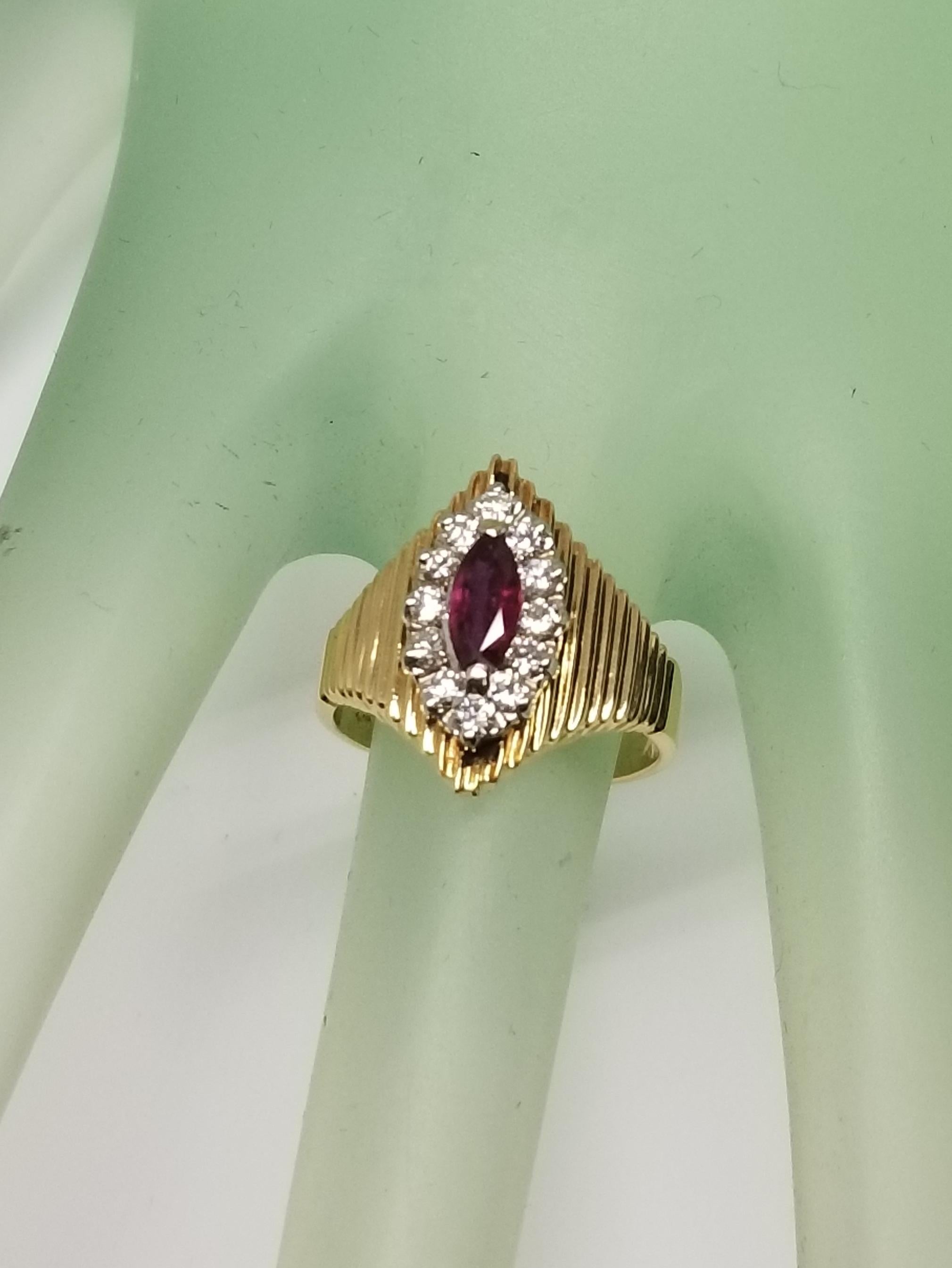 Contemporary Marquise Cut Ruby and Diamond 14 Karat Ring