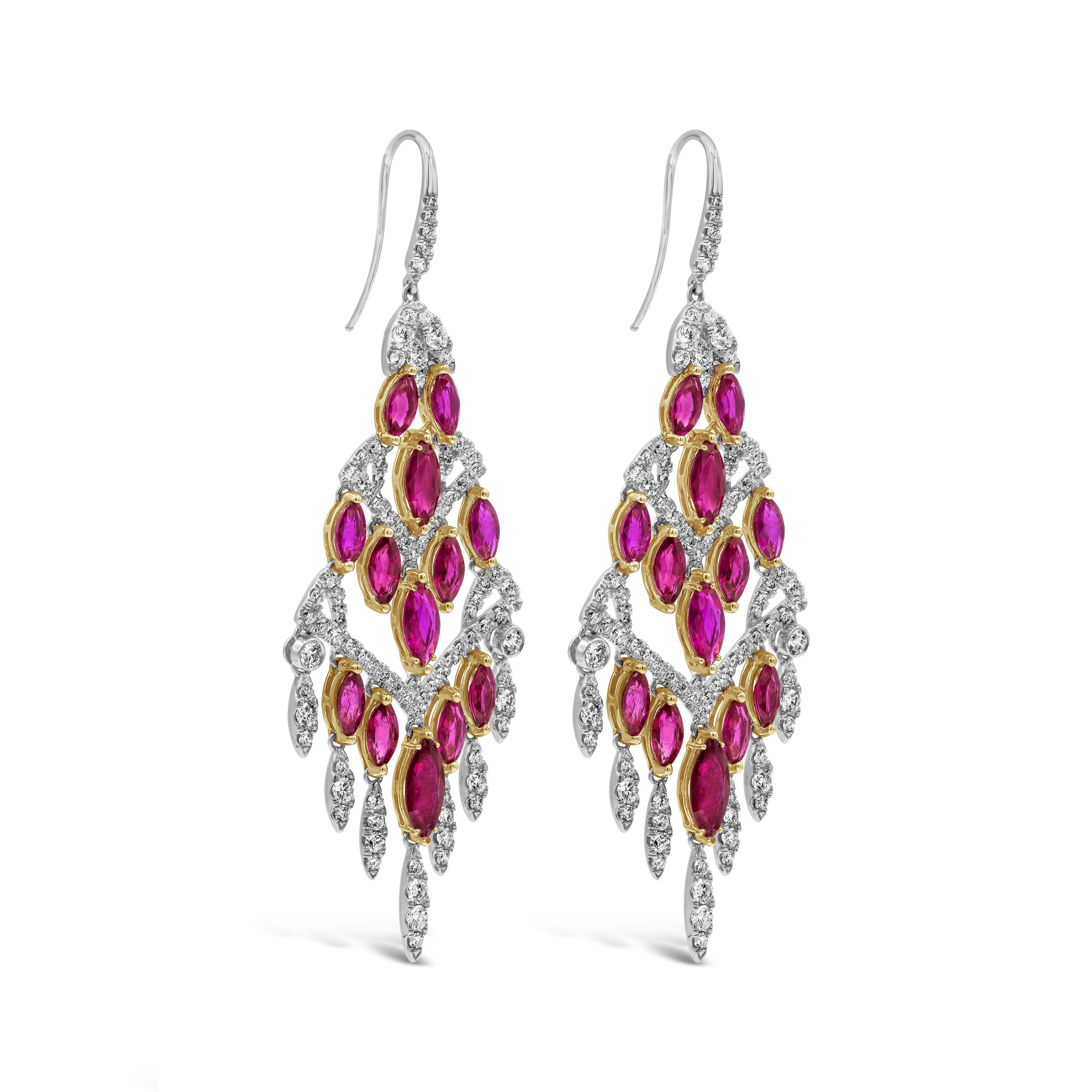 A delicate and exquisite pair of chandelier earrings showcasing 26 marquise cut red rubies weighing 16.29 carats total and 4.42 carats of brilliant round diamonds. Set in an elegant open work dangling chandelier design and Finely made in 18K White