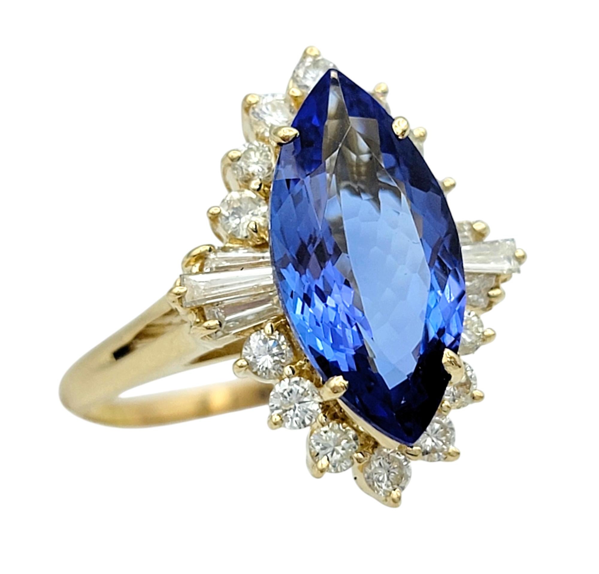 Ring Size: 8.75 

Step into a world of enchanting elegance with this mesmerizing tanzanite and diamond ring. At its heart lies a breathtaking marquise-cut tanzanite, radiating a rich violet-blue hue that dances with light. The stone is surrounded by