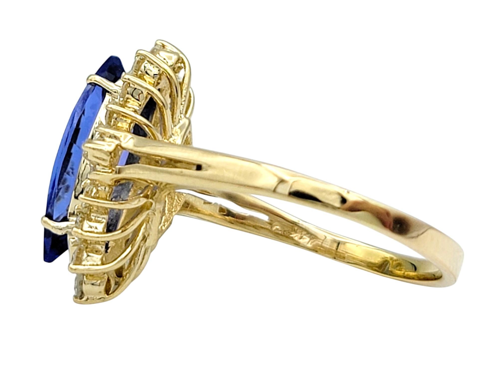 Marquise Cut Tanzanite Cocktail Ring with Diamonds in 14 Karat Yellow Gold For Sale 1
