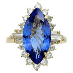 Marquise Cut Tanzanite Cocktail Ring with Diamonds in 14 Karat Yellow Gold