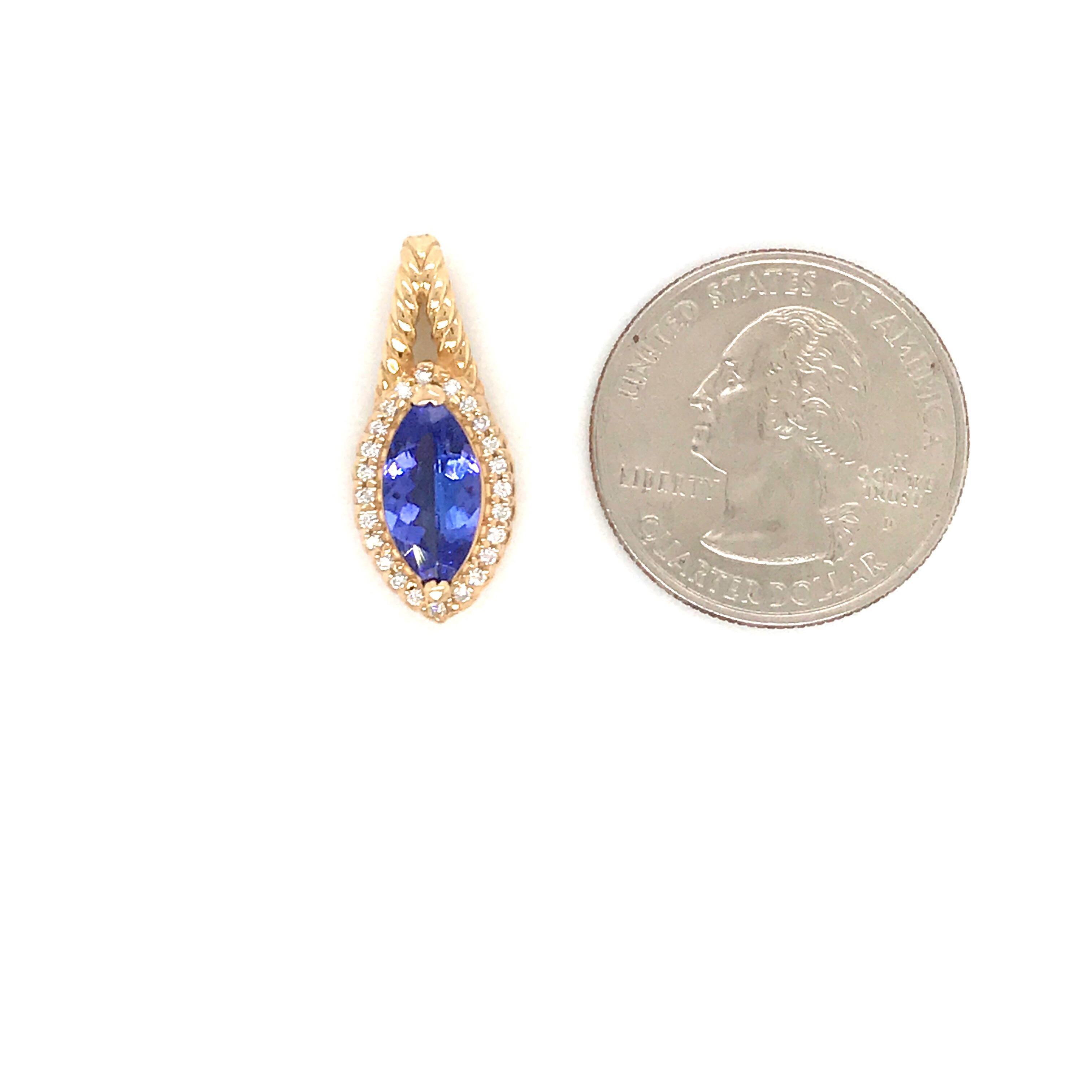 14K Yellow gold pendant featuring one marquise cut tanzanite weighing 1.80 carats flanked with round brilliance weighing 0.17 carats. Comes with 16 inch yellow gold chain.
Color G
Clarity SI 
