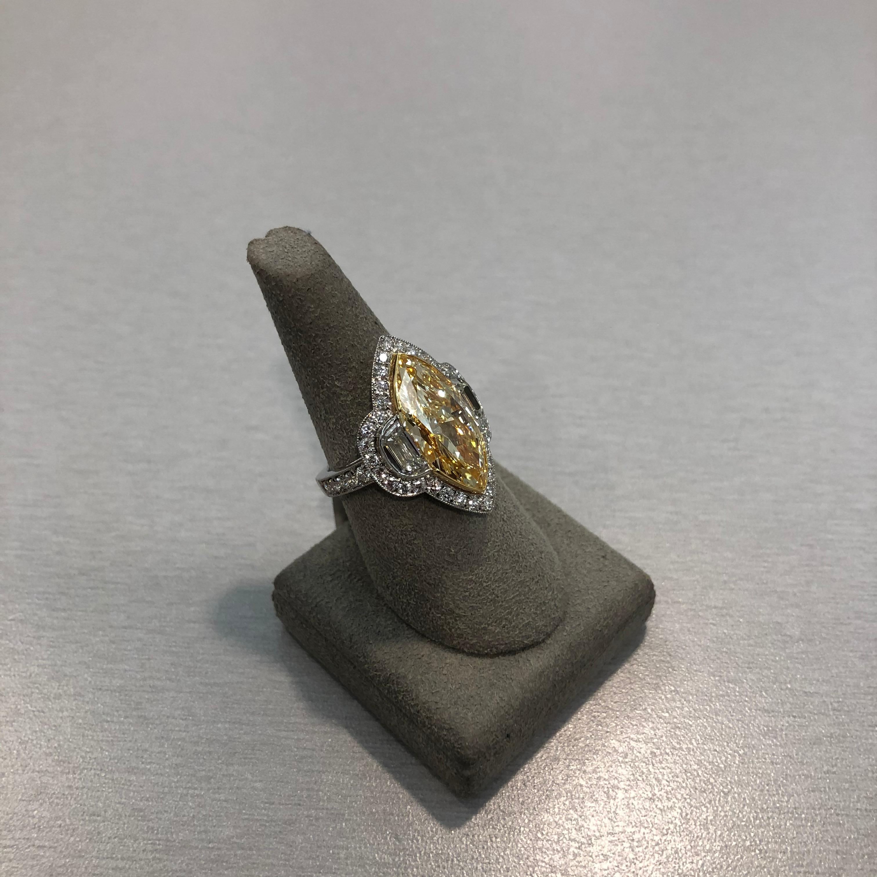 GIA Certified 5.43 Carat Marquise Cut Yellow Diamond Halo Engagement Ring In New Condition For Sale In New York, NY