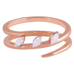 Bague en forme de spirale en or 14 carats avec diamants marquises