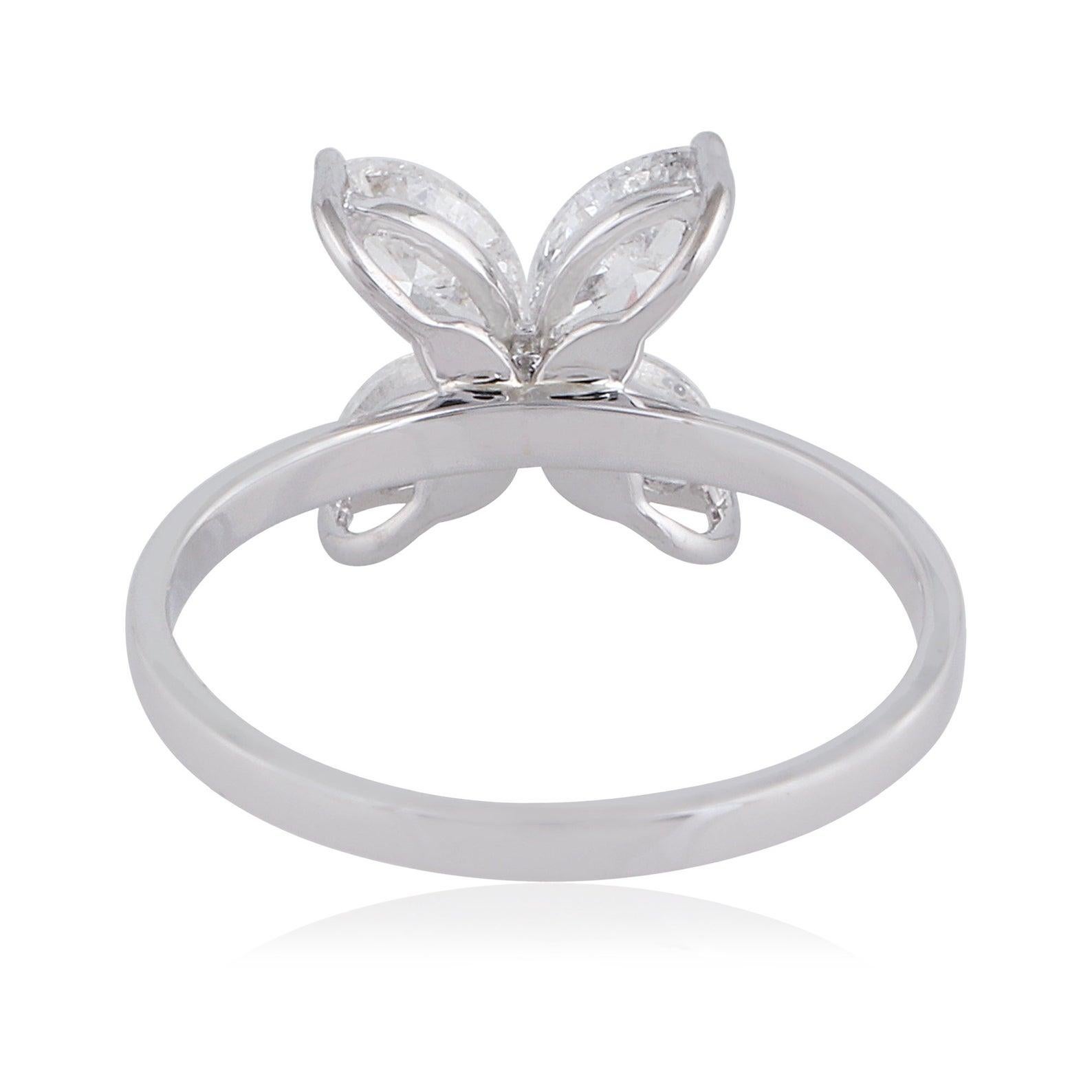 This ring has been crafted from 14-karat white gold and hand set with 1.30 carats of marquise diamonds. Available in white, rose and yellow gold.  Also available matching earrings.

The ring is a size 7 and may be resized to larger or smaller upon