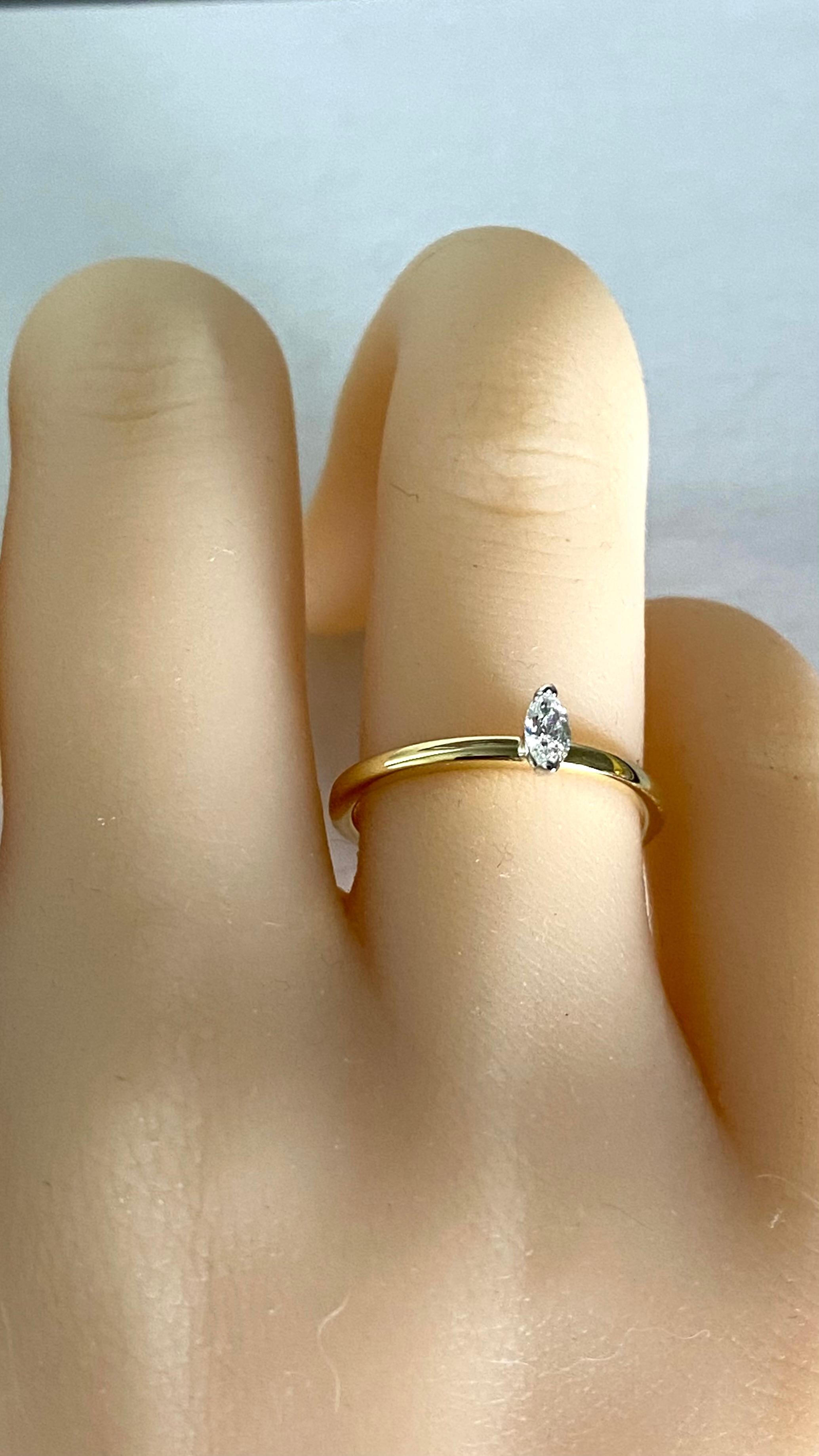 Contemporary Marquise Diamond 18 Karat Yellow and White Gold Engagement or Friendship Ring