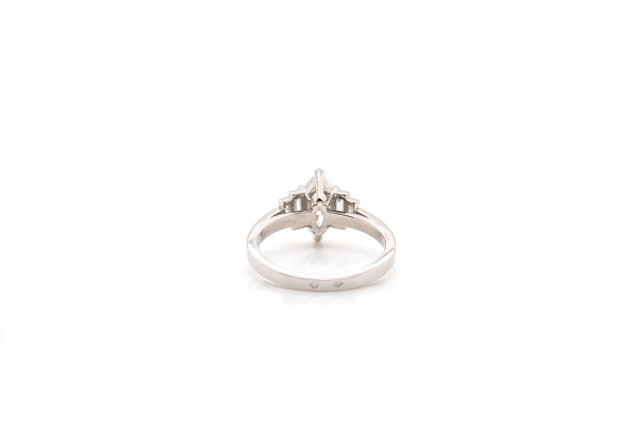 Women's or Men's Marquise diamond and baguette diamonds ring in platinum For Sale