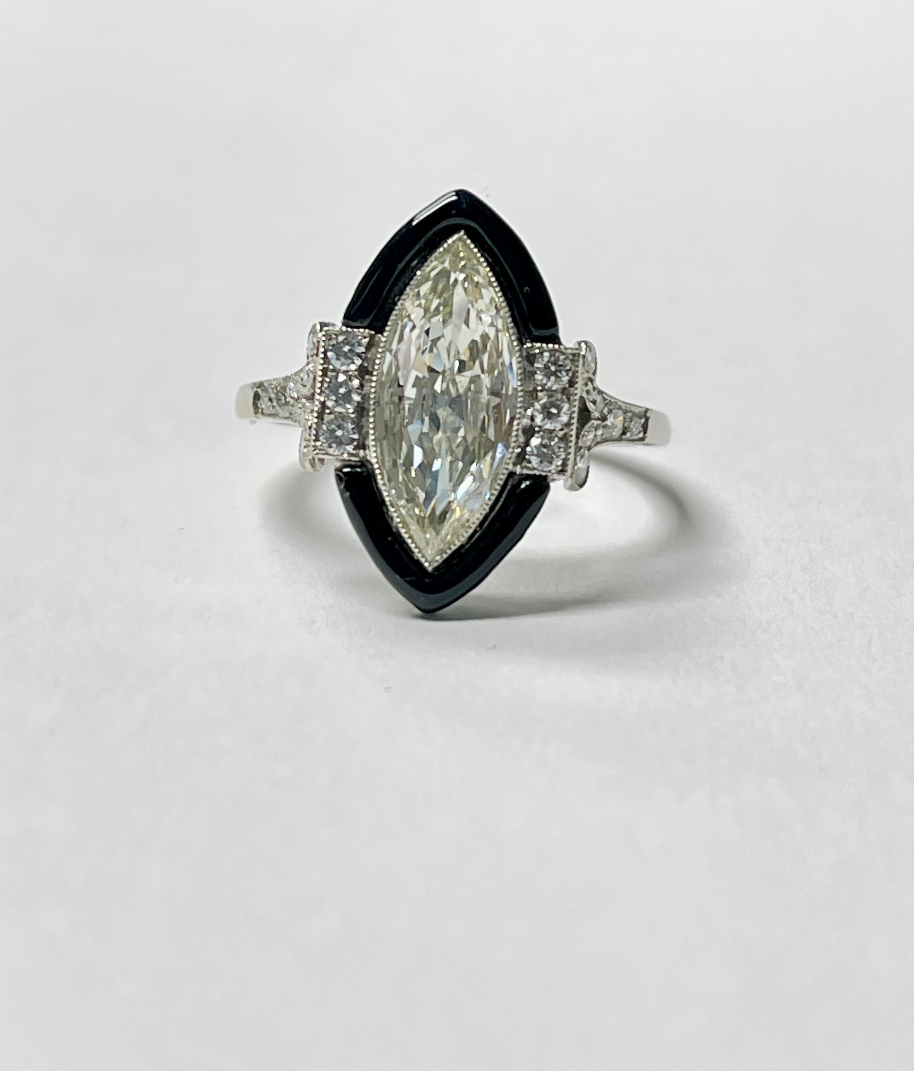 Marquise Diamond And Enamel Engagement Ring Handcrafted In Platinum. 
Marquise diamond weight : 1.25 Carat with I color and VS2 clarity 
Metal : Platinum 
Ring Size : 6 1/2 


