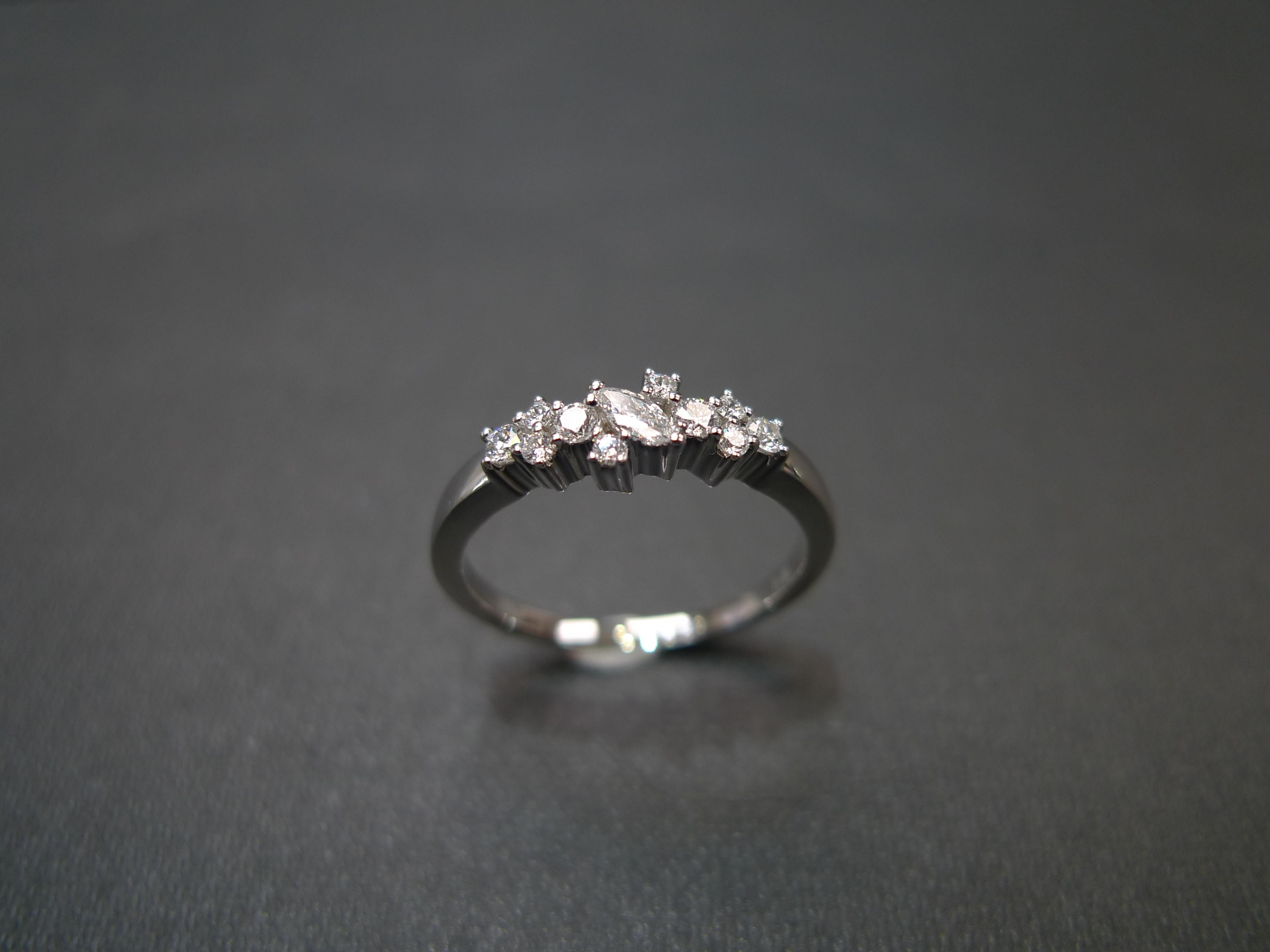 For Sale:  Marquise Diamond and Round Brilliant Diamond Wedding Ring in 18k White Gold 7