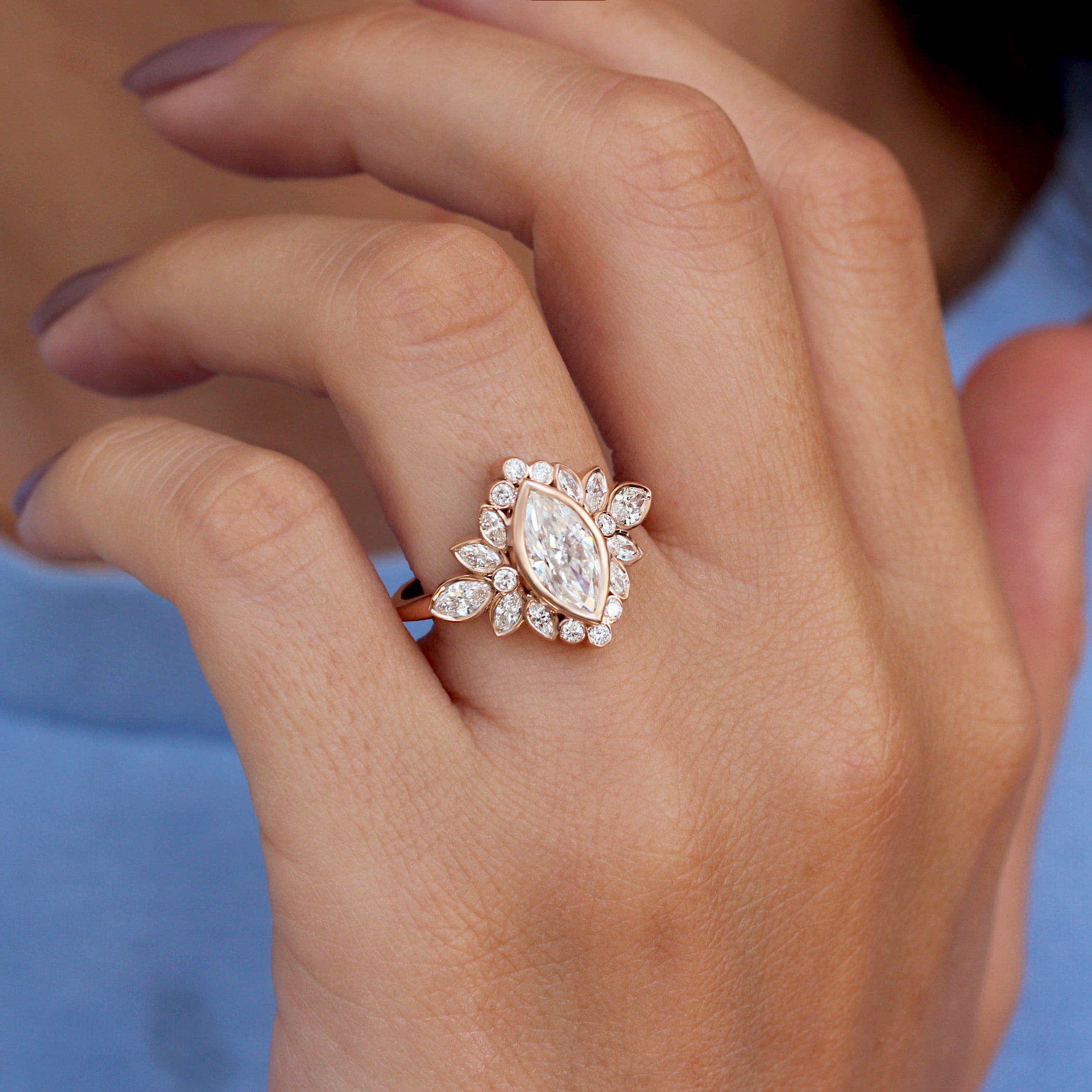 Beautiful Marquise Diamond Floral cluster Engagement Ring, all diamonds are bezel set. Designed by Silly Shiny Diamonds.
 A Luxurious and unique design, handmade with ethical and environmentally friendly stones. 
The perfect ring that doesn't catch