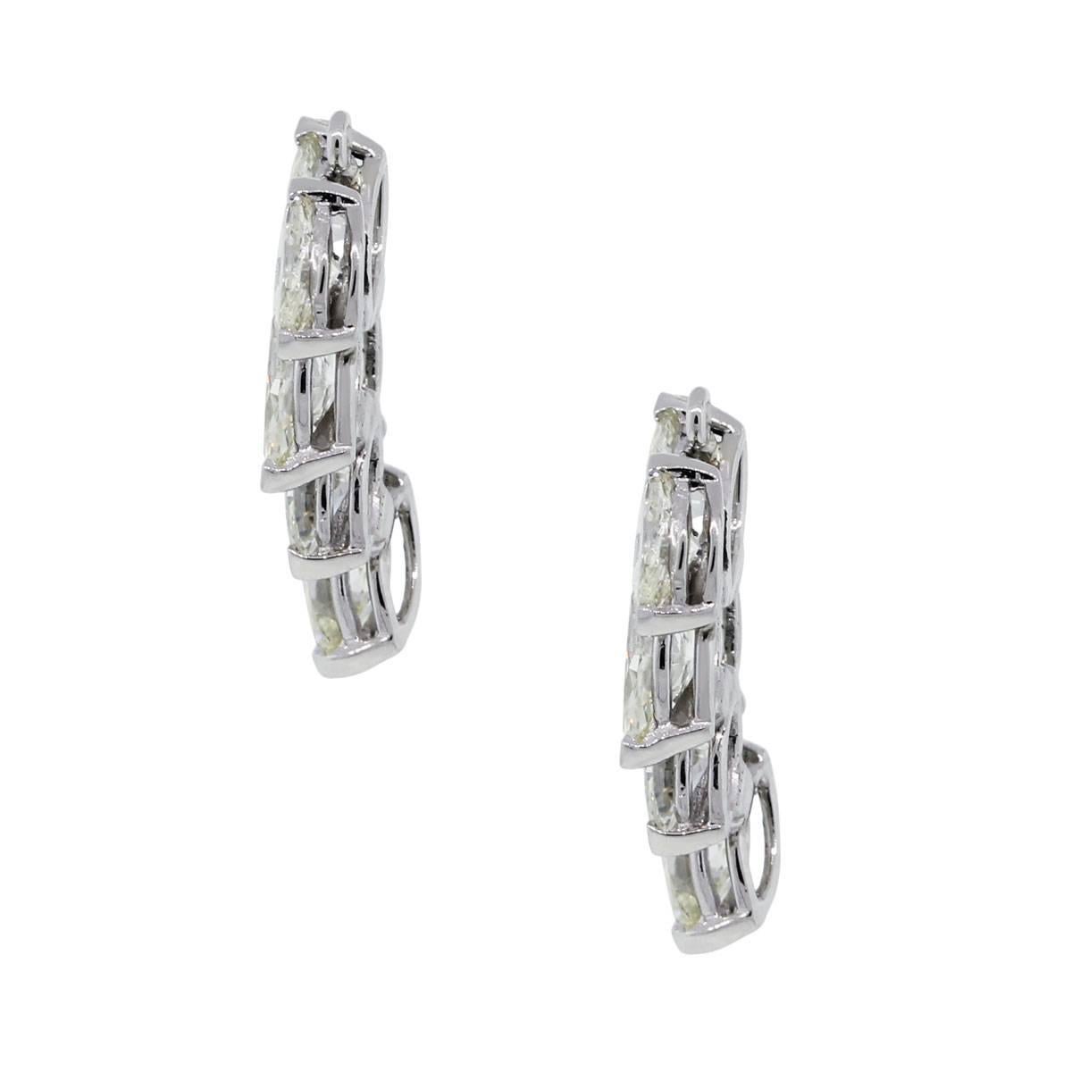 Material: Platinum
Diamond Details: Approximately 6ctw of marquise shape diamonds. Diamonds are I/J in color and VS in clarity.
Measurements: 0.88″ x 0.20″ x 0.51″
Clasp: Earring jackets
Total Weight: 6.4g (4.1dwt)
Additional details: Item comes