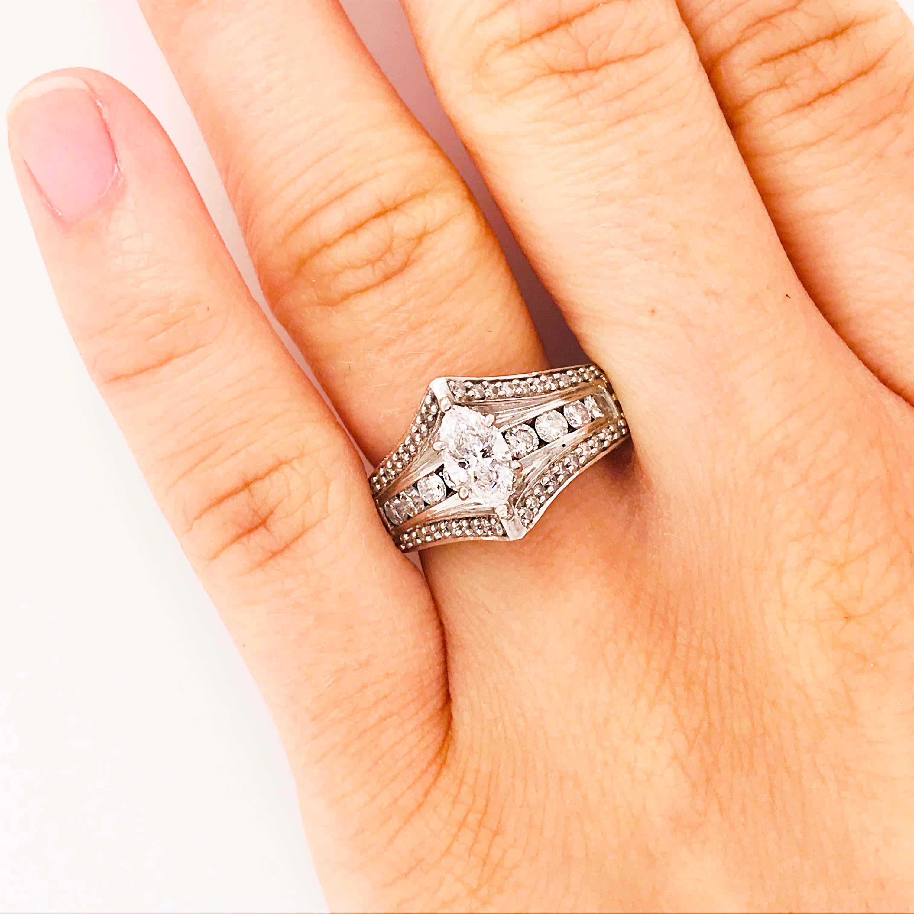 This gorgeous diamond engagement ring is a beautifully crafted, custom design with precious metals and genuine, natural diamonds! The earth mined marquise diamond engagement ring has a genuine, natural marquise shaped diamond set in a six prong
