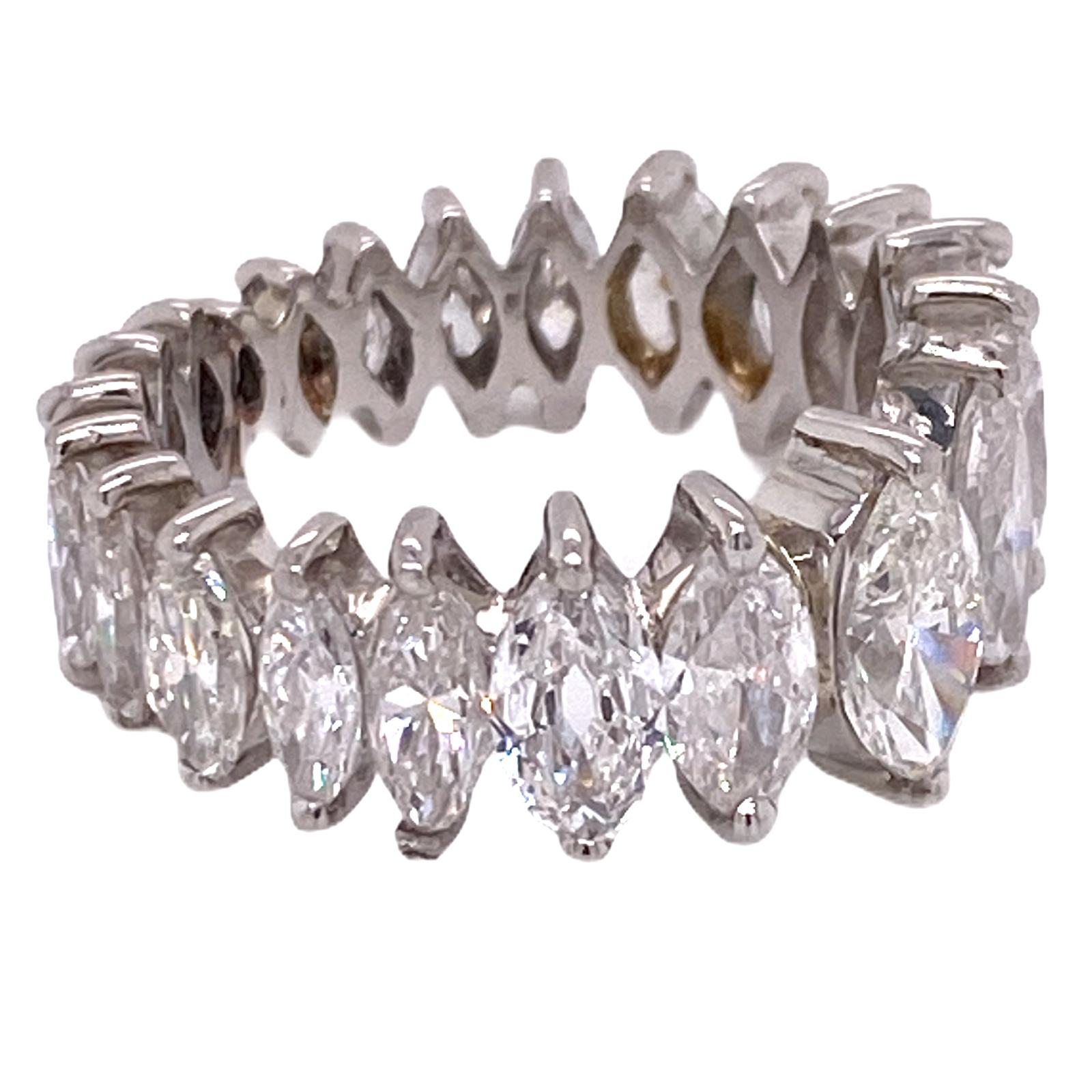 Beautiful graduated diamond eternity band handmade in platinum. The 22 marquise diamonds weigh approximately 3.00 carat total weight, and are graded G-H color and VS clarity. The band is size 6, and is graduated from 9mm in the front to 7mm in the