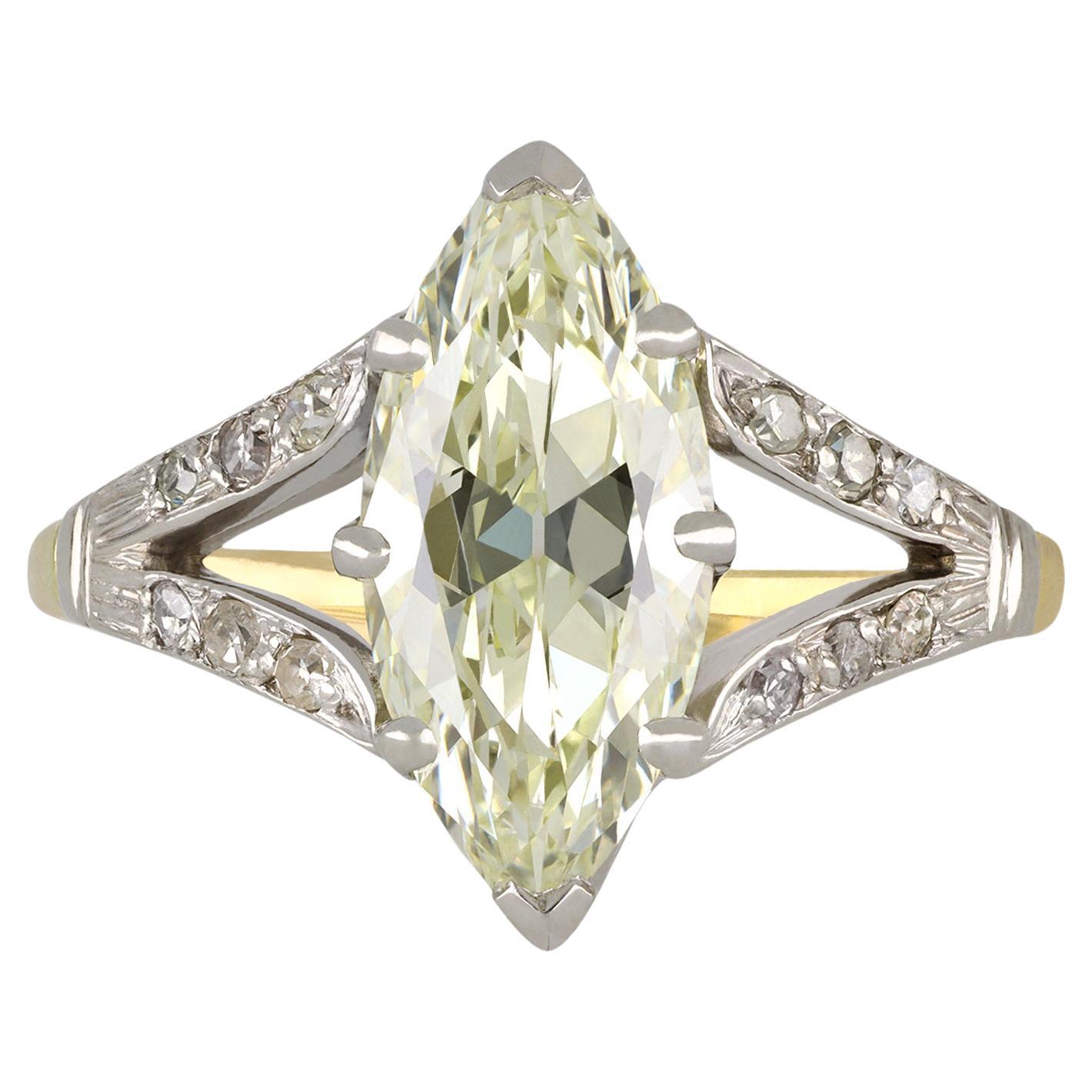 Marquise diamond flanked solitaire ring, circa 1910.  For Sale