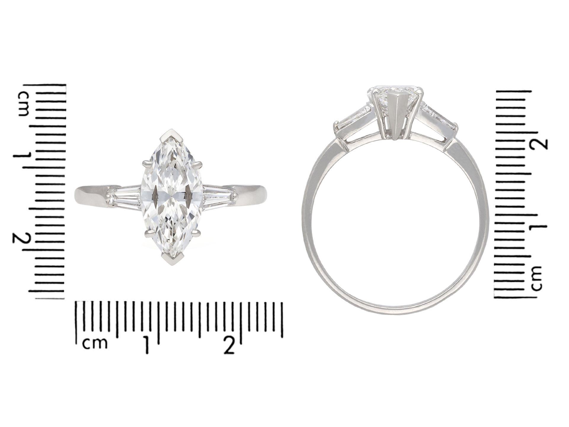 Marquise diamond flanked solitaire ring, circa 1950. In Good Condition For Sale In London, GB