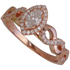 Marquise Diamond Halo Engagement Ring Set in Rose Gold and Diamonds Twist Shank