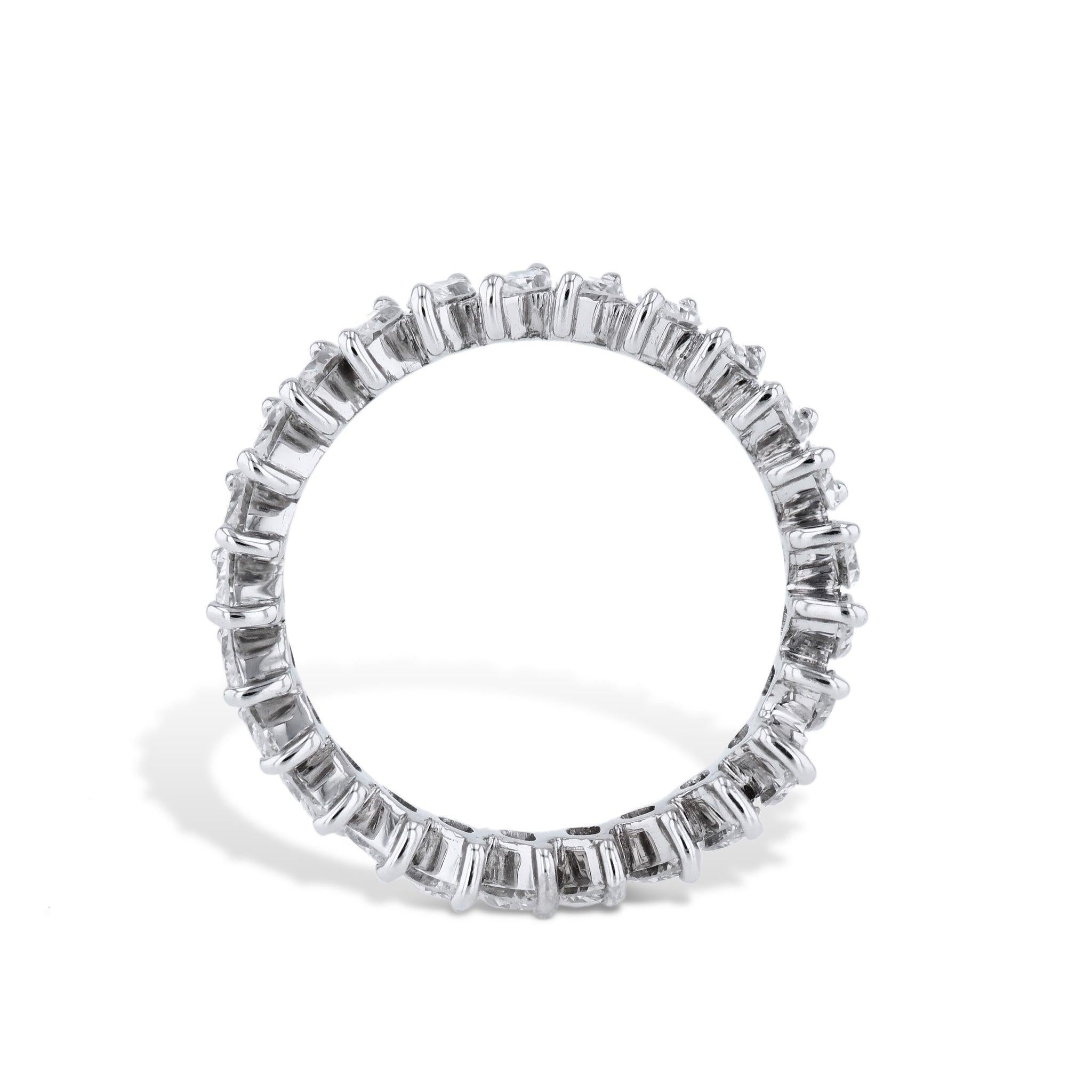 Be captivated by the luxurious beauty and exquisite allure of this Marquise Diamond Platinum Estate Eternity Band. Adorned with Marquise cut diamonds set at an angle. This size 6.5 Estate Ring is the perfect symbol of love, beauty, and