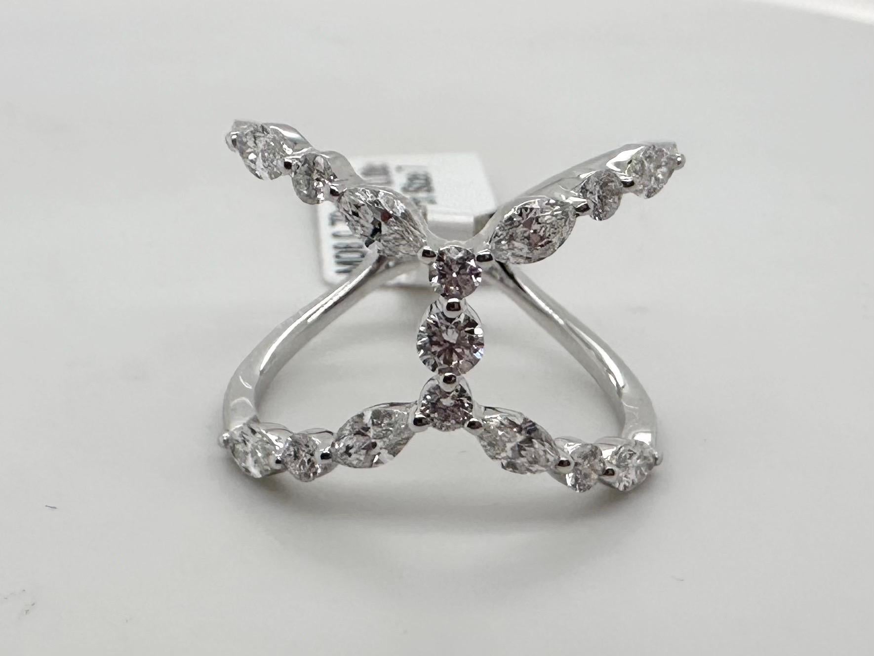 Stunning marquise diamond ring in 18KT white gold made with 1.01 cararts of diamonds VS clarity D/E/F colors (fine quality) will come with certificate of authenticity in your name. Ring is size 7 and can be adjusted.


ABOUT US
We are a family-owned