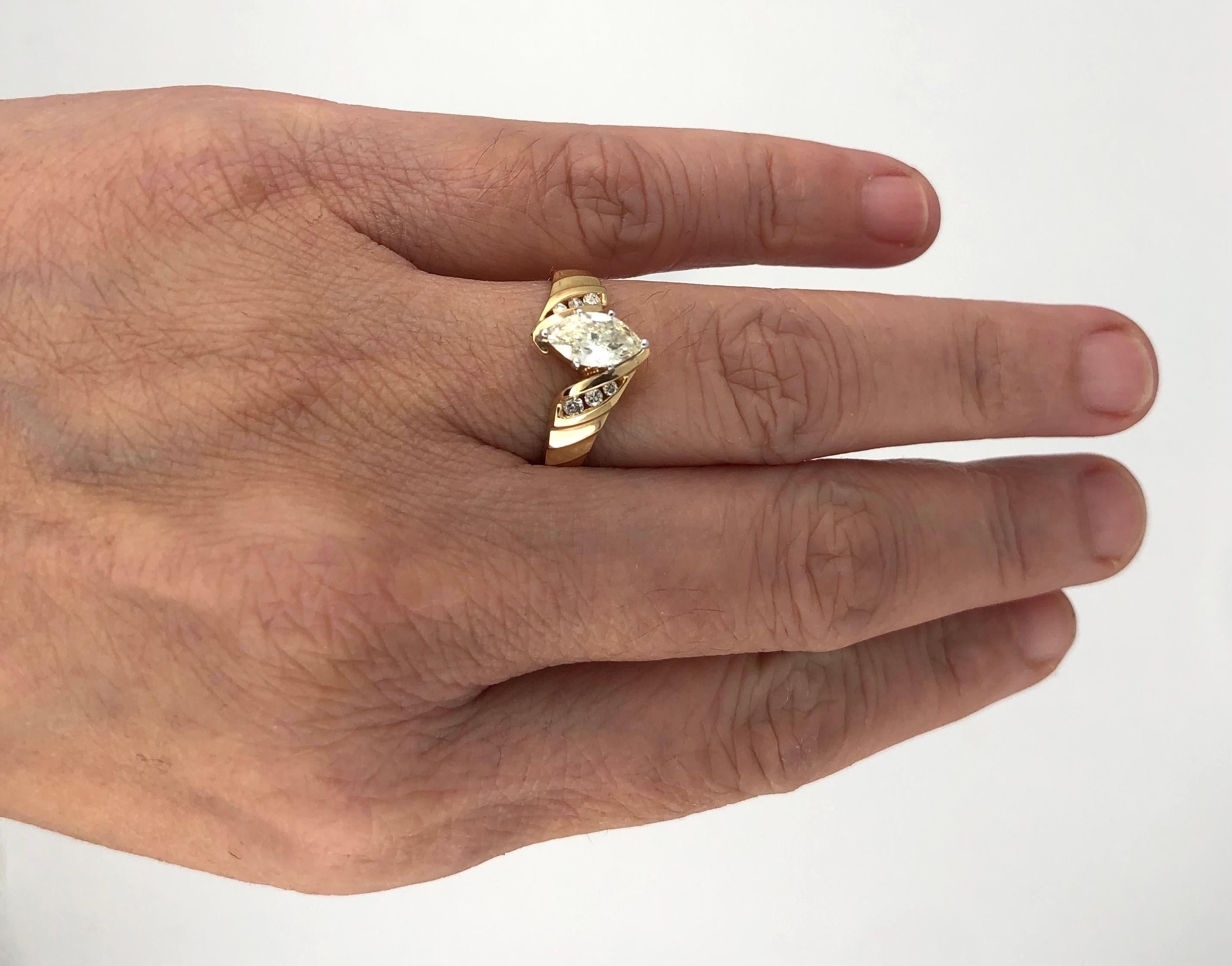 side set marquise diamond ring