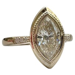 Marquise Diamond Ring in 14k Yellow Gold Bezel Setting