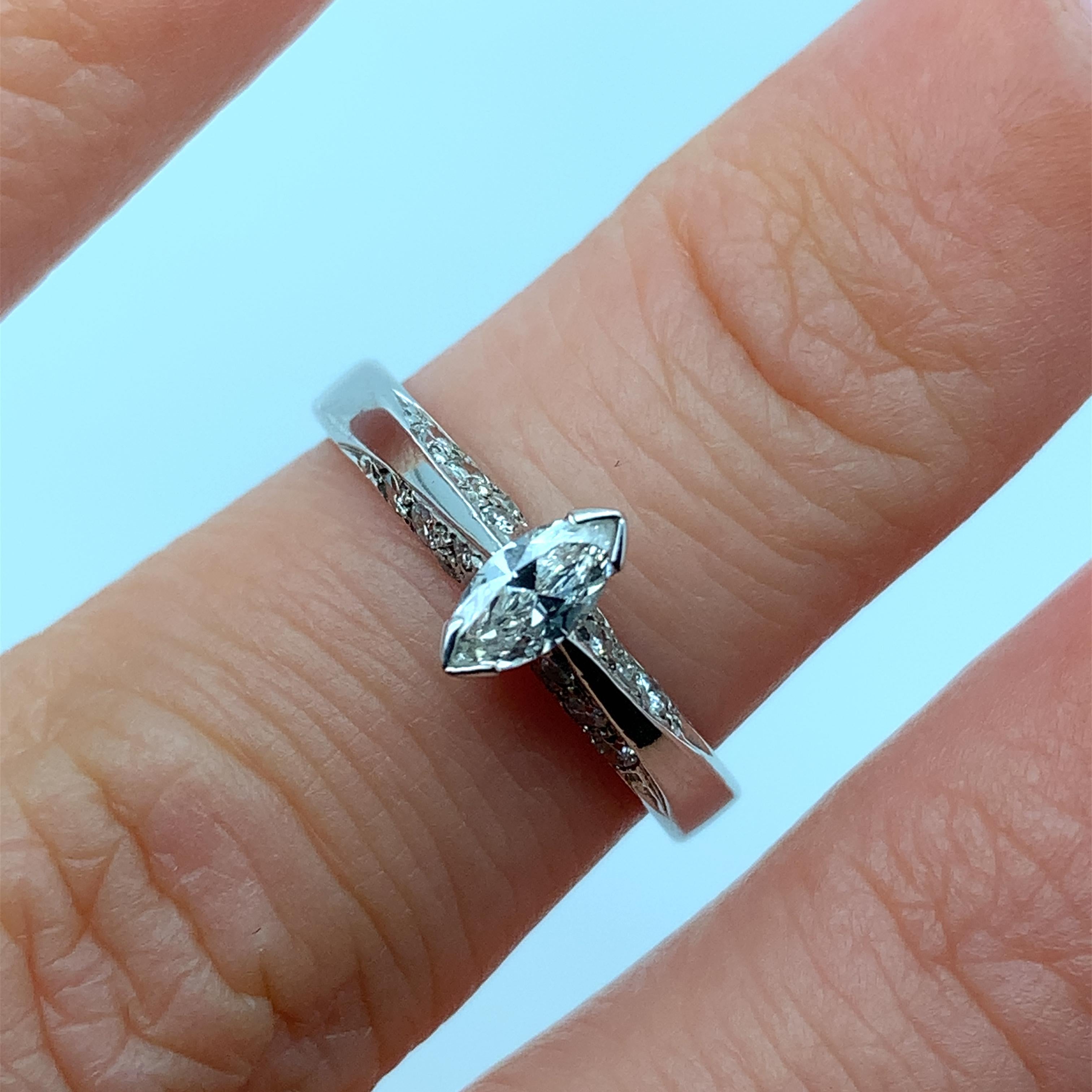 
0.50ct Marquise Diamond Antique Engagement Ring Solitaire Victorian In 18k Gold.

Diamonds total 0.50ct

Marquise 0.25ct G colour, VS1 clarity

0.25ct additional diamonds

The ring can be resized

Box and valuation is included.
This exquisite 18k