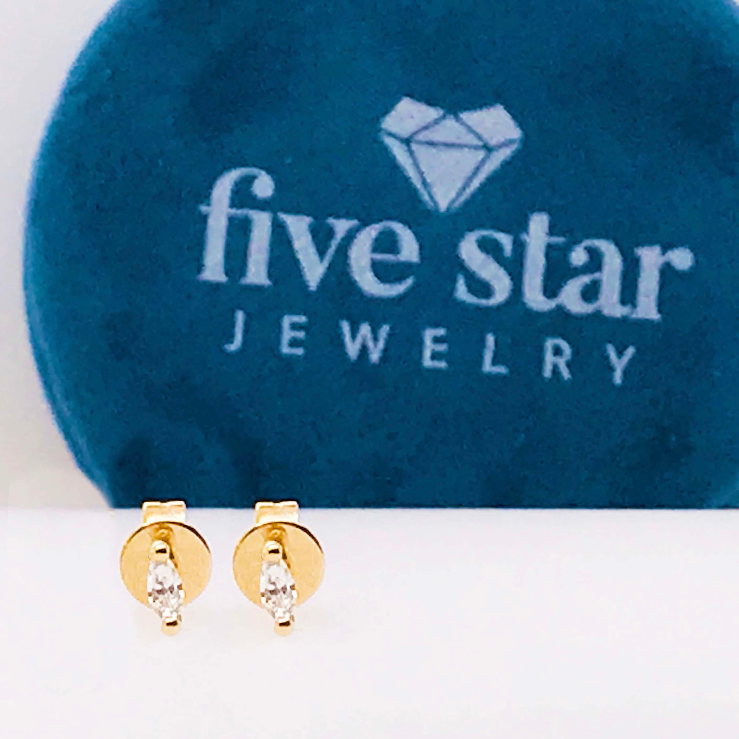 These marquise diamond solitaire earring studs are the perfect everyday studs! With a genuine marquise shaped diamond set in a two prong solitaire setting in the earring. The earrings are 14k yellow gold. Diamond stud earrings are a staple in fine