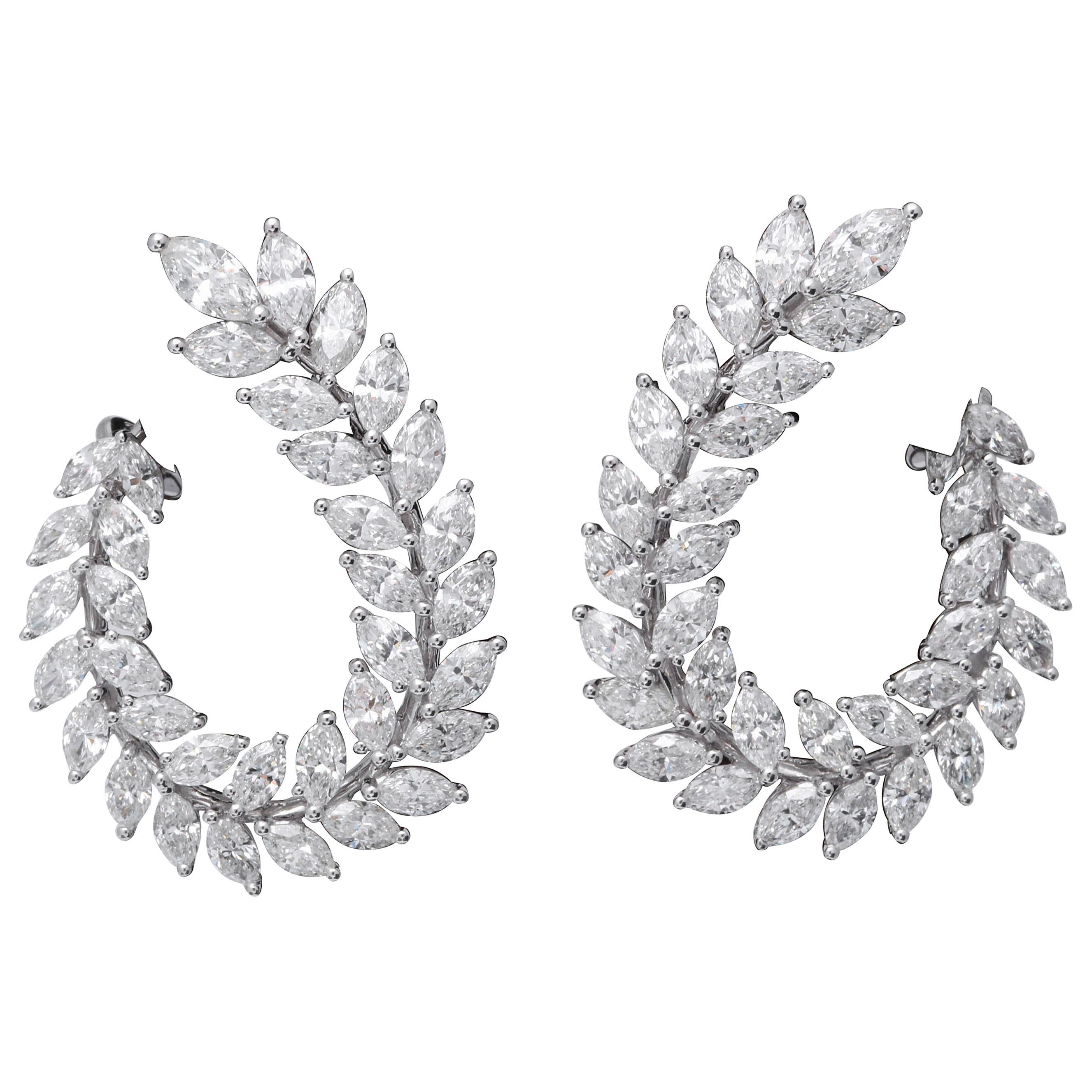 Boucles d'oreilles en forme de tourbillon avec diamants marquises