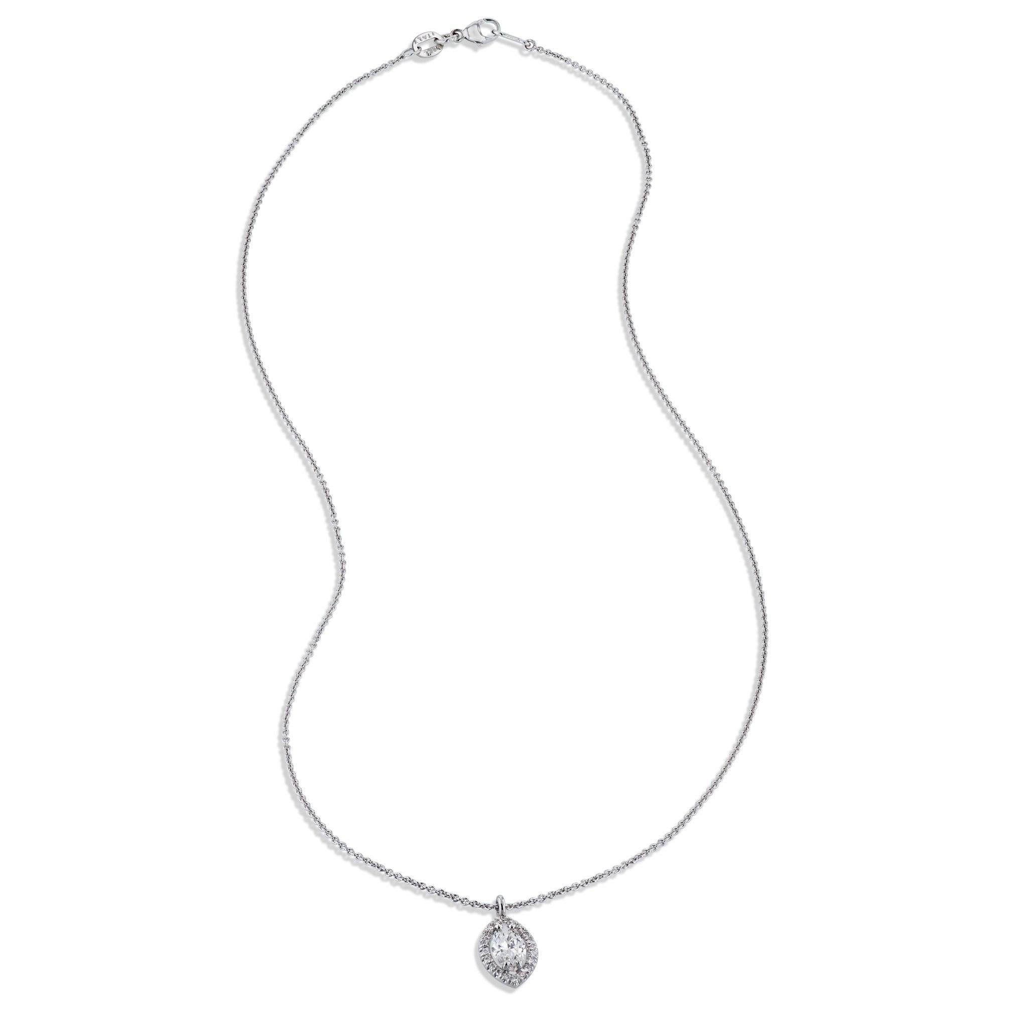 This gorgeous necklace, handmade by H&H Jewels, is sure to make a statement! Exquisitely crafted from 18K white gold, this pendant sparkles with a magnificent  marquise cut diamond as its centerpiece. A diamond halo adds a pop of luxe to your style
