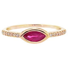 Marquise East West Ruby Ring with Round Diamonds in 14K Yellow Gold