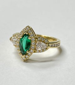 Marquise Emerald and Diamond Engagement Ring in 18K Yellow Gold