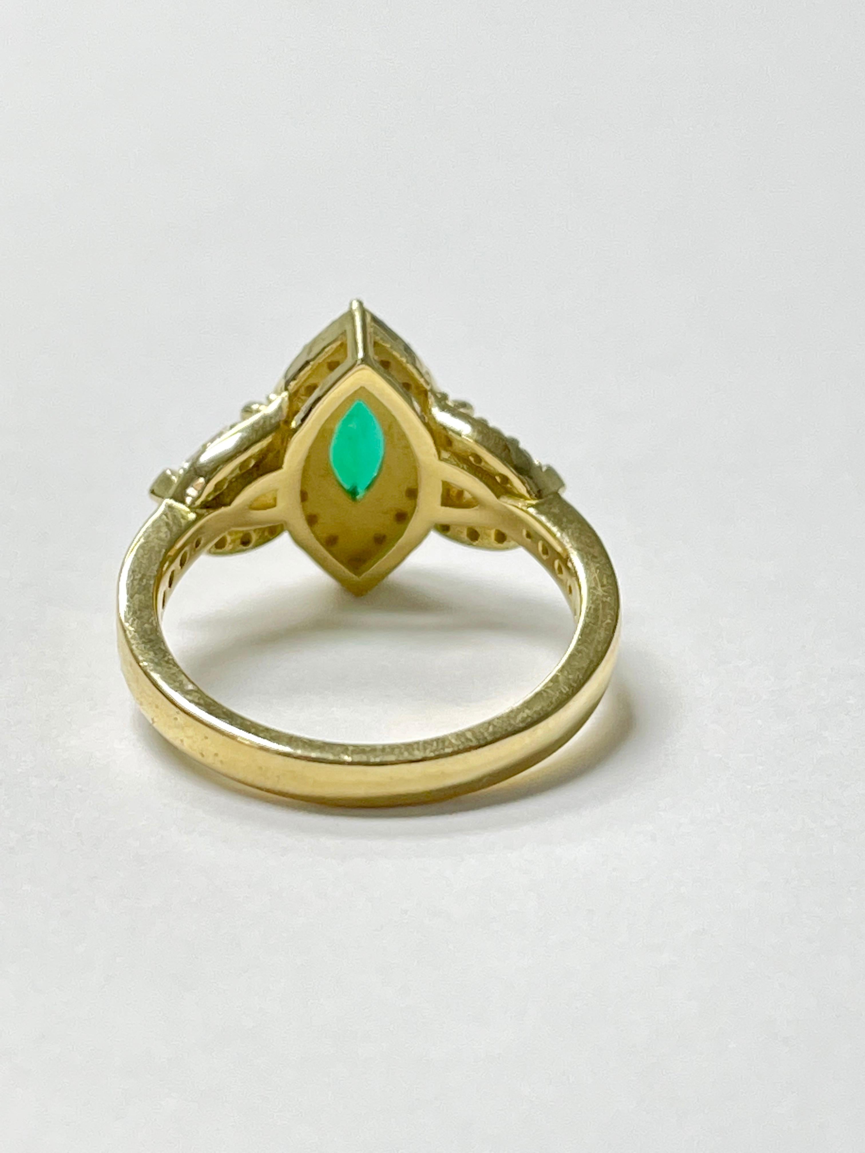 Contemporary Marquise Emerald and Diamond Engagement Ring in 18K Yellow Gold For Sale