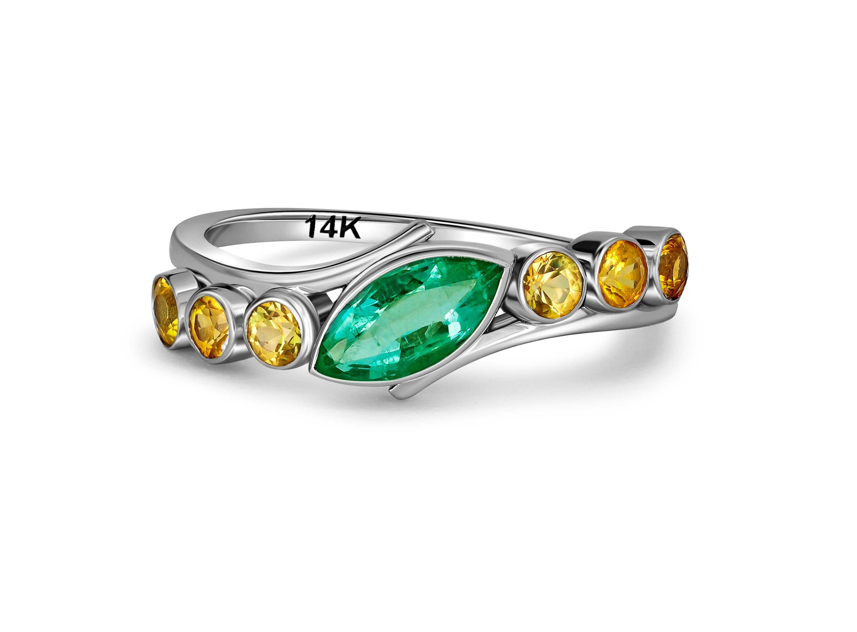 Marquise emerald ring in 14k gold. 
Emerald and yellow sapphire ring. Minimalist emerald ring. Emerald engagement ring. May Birthstone ring.

Metal: 14k gold
total weight 1.50 g. depends from size.

Gemstones:
Emerald: marquise shape, green color,