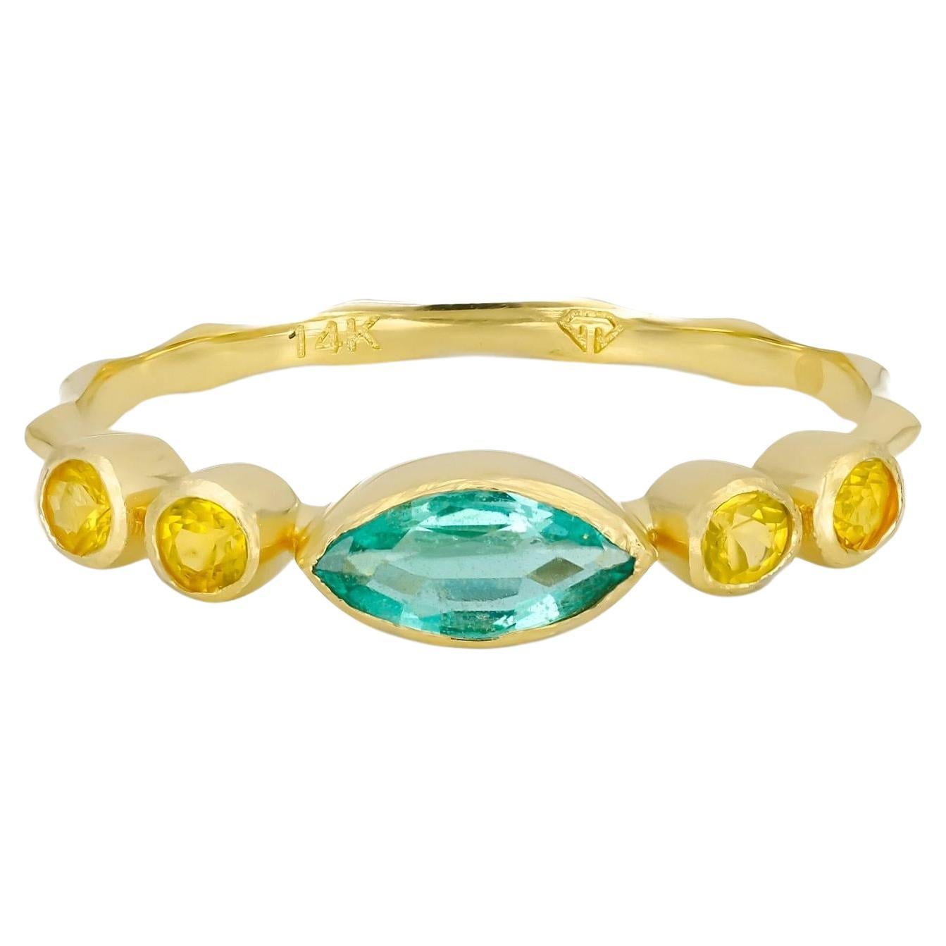 Marquise emerald ring in 14k gold