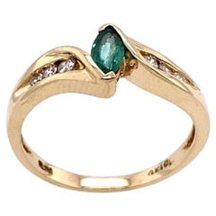 Marquise Emerald Ring with 3-Diamonds on Each Shoulder in 14ct Yellow Gold