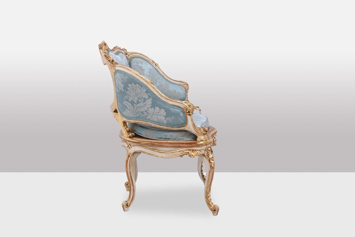 Louis XV Marquise in gilded and carved wood in the LXV style. Circa 1880.