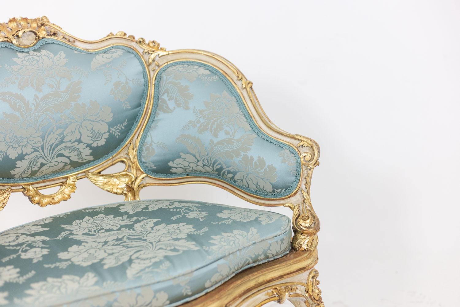 Fabric Marquise in gilded and carved wood in the LXV style. Circa 1880.